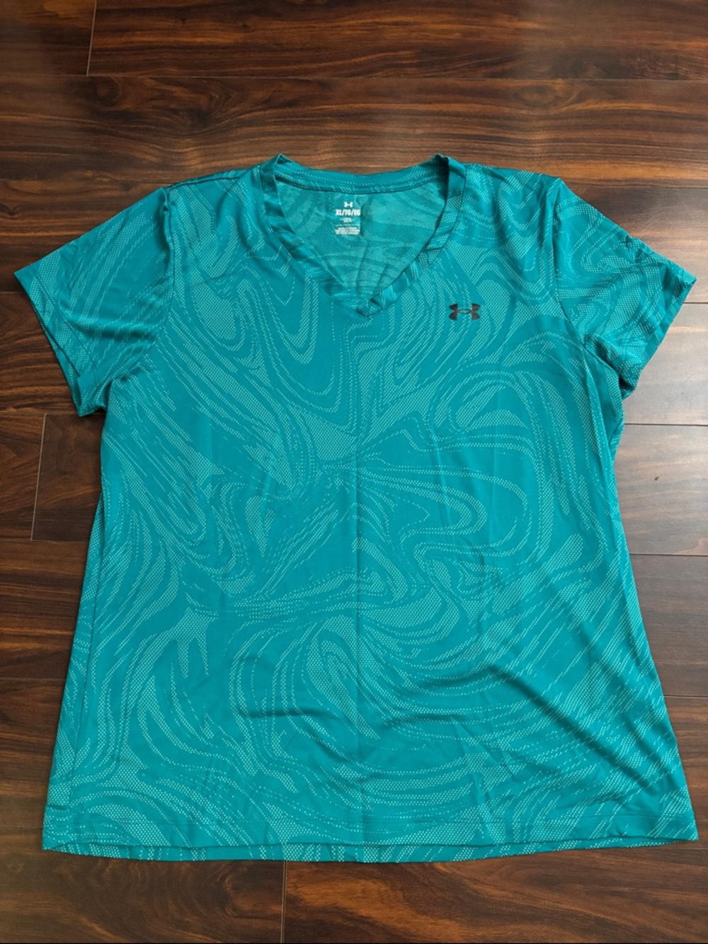 Under Armour Women’s Teal Swirl Performance V-Neck Tee
